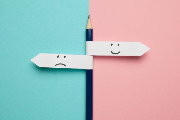 Pencil direction indicator choice of sad or happy mood